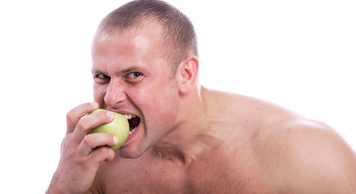 athlete eating apple